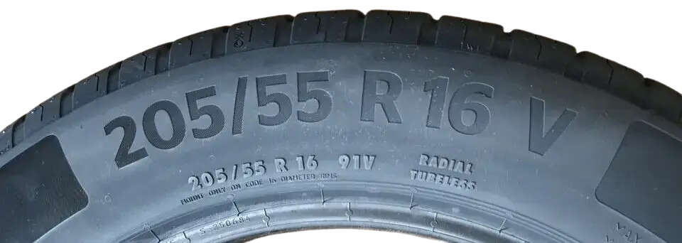 Close-up of tyre speed rating letters on sidewall